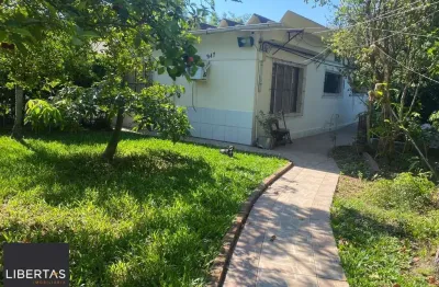Casa com 3 quartos à venda na Estrada João Passuelo, 947, Vila Nova, Porto Alegre