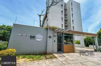 Apartamento de 2 dormitórios, living, cozinha planejada, área de serviço, banhei