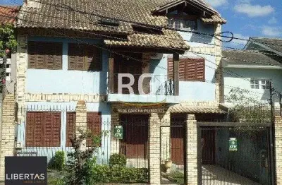 Casa à venda – 320m², 3 dormitórios (1 suíte), 5 vagas – partenon