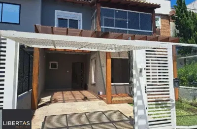 Casa com 3 quartos à venda na Rua Aldo Sani, 84, Hípica, Porto Alegre