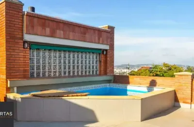 Casa em condomínio fechado com 3 quartos para alugar na Avenida Jacuí, 978, Cristal, Porto Alegre
