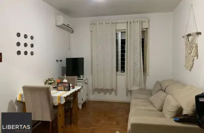 Apartamento de 2 dormitórios, living, cozinha, área de serviço e banheiro social