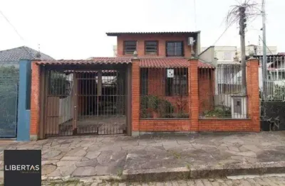Venda de casa 3 dormitórios com suíte e churrasqueira no partenon