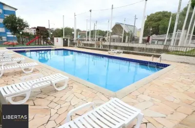 Apartamento térreo 2 dormitórios em condomínio fechado com piscina e infra compl