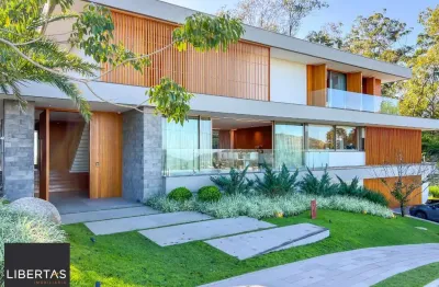 Casa em condomínio 4 dormitórios à venda vila nova porto alegre/rs