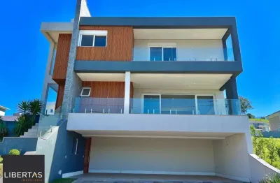 Casa em condomínio 4 dormitórios à venda vila nova porto alegre/rs