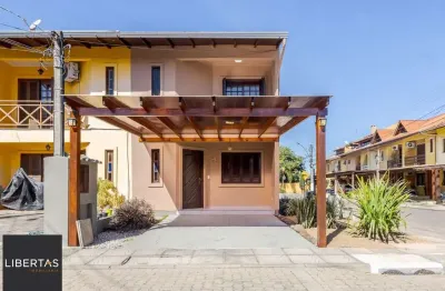 Casa em condomínio fechado com 3 quartos à venda na Avenida Edgar Pires de Castro, 1286, Hípica, Porto Alegre