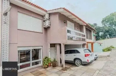 Casa em condomínio no bairro santo antômnio de 4 dormitórios e 2 vagas
