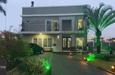 Casa sobrado no condomínio golden river em imbé com 4 dormitórios