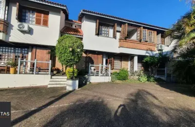 Casa em condomínio fechado com 3 quartos à venda na Avenida da Cavalhada, 6021, Cavalhada, Porto Alegre