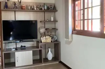 Casa com 4 quartos à venda na Rua Santos, 285, Campo Novo, Porto Alegre