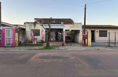 Prédio 10,00 x17,00 metros com uma casa de alvenaria nos fundos rua primavera