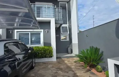 Sobrado com 130,33 m² com 3 dormitórios rua das camelias igara canoas rs.
