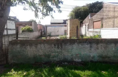 Terreno com casa mista na rua santa clara bairro rio branco canoas rs