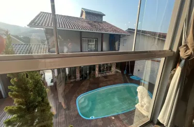 Casa com 4 quartos à venda em fundos, biguaçu  por r$ 960.000