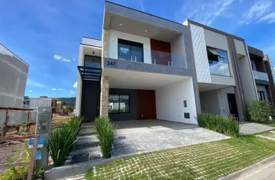 Casa em condomínio fechado com 3 quartos à venda em deltaville, biguaçu  por r$ 1.295.000