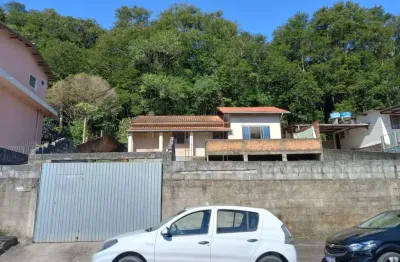 Casa com 3 quartos à venda em fundos, biguaçu  por r$ 400.000