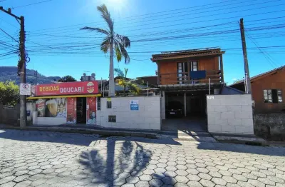 Casa com 5 quartos à venda em fundos, biguaçu  por r$ 690.000