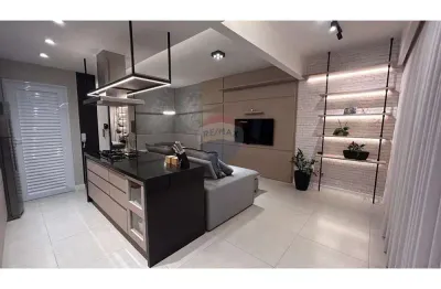 Apt novo de 77 m ² com 2 suites, sala/cozinha , lavanderia , 01 vaga garagem,lavabo