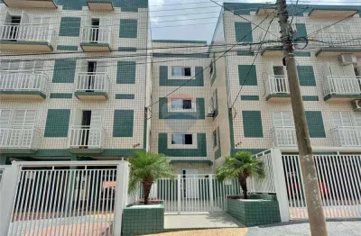 Apartamento com dois dormitórios, sendo um com suíte e garagem coberta.