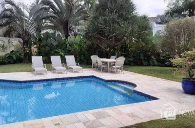 Sobrado a venda no condomínio jardim acapulco - guaruja