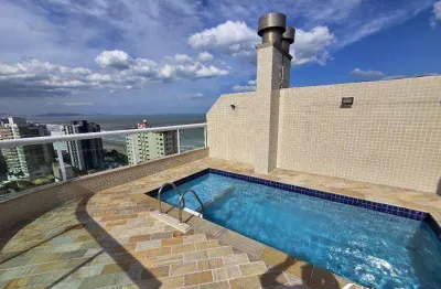 Cobertura triplex com vista mar à venda na praia grande – 5 dorms, piscina e lazer completo