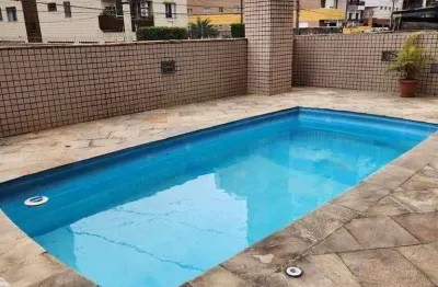 Apartamento 2 quartos com suíte e vista lateral mar na guilhermina – praia grande