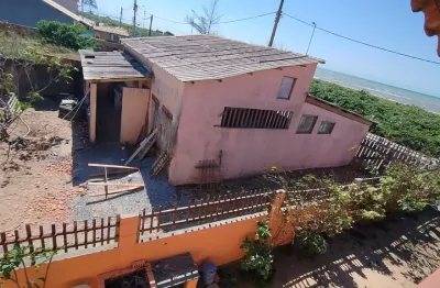 Loja comercial de frente para a praia com excelente terreno!!