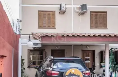 Casa em condomínio fechado com 3 quartos à venda na Rua Sílvio Silveira Soares, Camaquã, Porto Alegre