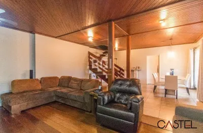 Casa com 3 quartos à venda na rua marquês do maricá, 444, vila nova, porto alegre por r$ 1.300.000