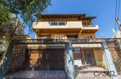 Casa com 4 quartos à venda na rua pinto da rocha, 383, partenon, porto alegre por r$ 890.000
