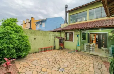 Casa com 3 quartos à venda na Rua Santos Zottis, Hípica, Porto Alegre