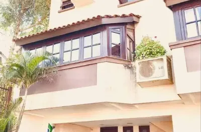 Casa com 3 quartos à venda na avenida wenceslau escobar, 3714, vila conceição, porto alegre por r$ 999.000