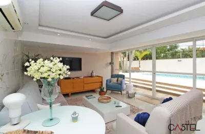 Casa com 4 quartos à venda na rua jacundá, 273, guarujá, porto alegre por r$ 1.090.000