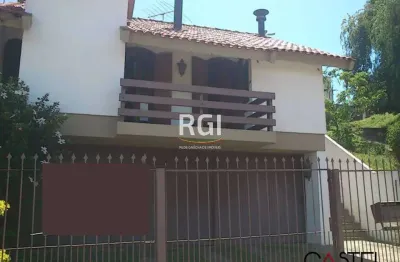 Casa com 3 quartos à venda na rua paulo bento lobato, 96, jardim lindóia, porto alegre por r$ 970.000