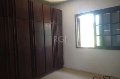 Casa com 3 quartos à venda na rua oscar ferreira, 155, rubem berta, porto alegre por r$ 320.000