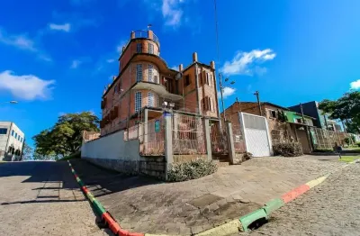 Casa com 5 quartos à venda na Rua Professora Ziláh Totta, Jardim Leopoldina, Porto Alegre