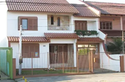 Casa com 3 quartos à venda na beco rui barbosa, 4690, fátima, canoas por r$ 980.000