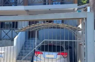 Casa em condomínio fechado com 2 quartos à venda na rua padre hildebrando de freitas pedroso, 222, tarumã, viamão por r$ 276.000