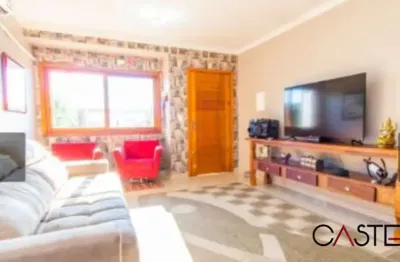 Casa com 3 quartos à venda na rua waldemar da silva tavares, 234, guarujá, porto alegre por r$ 490.000