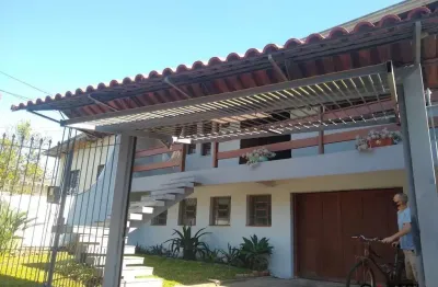 Casa com 3 quartos à venda na estrada joão vedana, 237, cavalhada, porto alegre por r$ 850.000