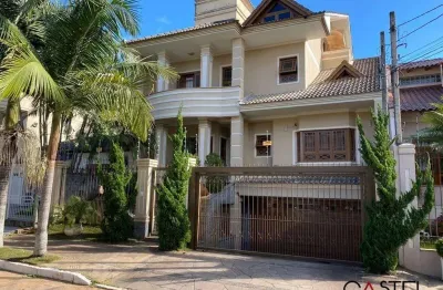 Casa com 4 quartos à venda na rua das bromélias, 240, estância velha, canoas por r$ 2.699.000