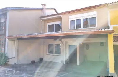 Casa em condomínio fechado com 3 quartos à venda na rua martim afonso, 115, santo antônio, porto alegre por r$ 750.000
