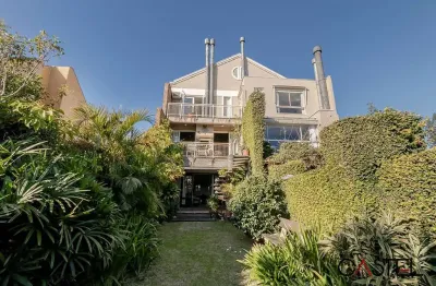 Casa com 3 quartos à venda na avenida general barreto viana, 618, chácara das pedras, porto alegre por r$ 1.500.000