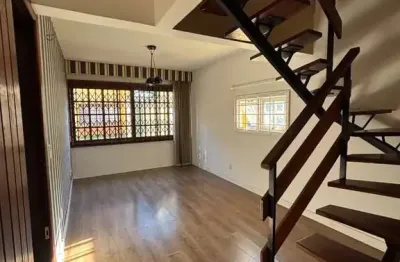 Casa em condomínio fechado com 3 quartos à venda na rua general gomes carneiro, 80, medianeira, porto alegre por r$ 450.000