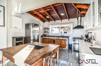 Casa com 3 quartos à venda na avenida felipe weimann, 138, santa tereza, porto alegre por r$ 540.000