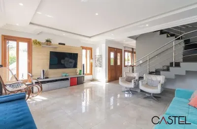 Casa em condomínio fechado com 3 quartos à venda na rua deputado hugo mardini, 1780, passo das pedras, porto alegre por r$ 1.550.000