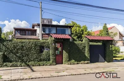 Casa com 3 quartos à venda na avenida guarujá, 140, guarujá, porto alegre por r$ 749.000