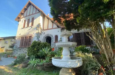 Casa com 4 quartos à venda na rua guaiana, 123, vila assunção, porto alegre por r$ 1.600.000