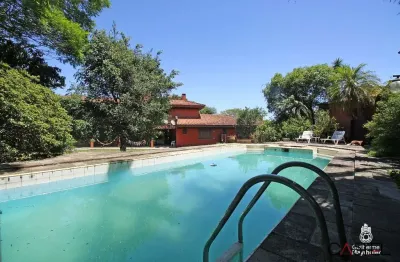 Casa em condomínio fechado com 4 quartos à venda na avenida firmino octávio bimbi, 255, cavalhada, porto alegre por r$ 2.230.000